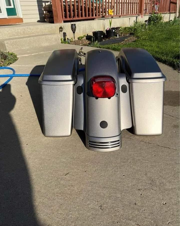 55c154df-9227-4953-9d7a-7a64a976dd01 a set of stock bags and rear fender